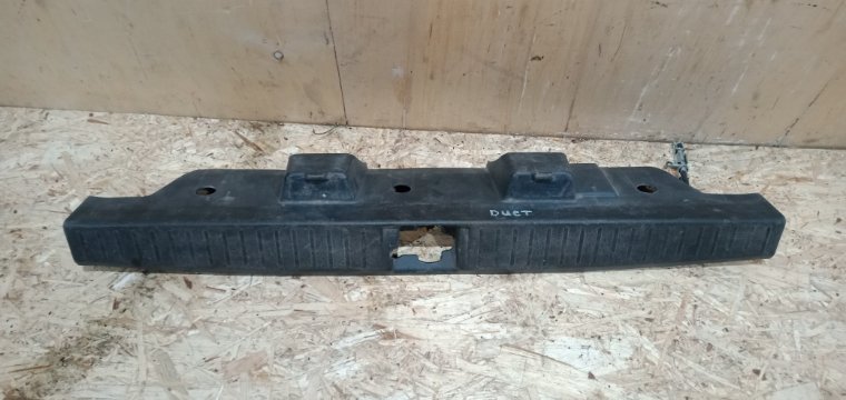Накладка замка багажника задняя TOYOTA DUET M100A EJVE 6471697201 Б/У