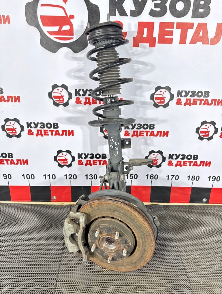 Стойка амортизатора Mazda CX5 KF 2017 перед. лев. (б/у) Mazda CX5 KF