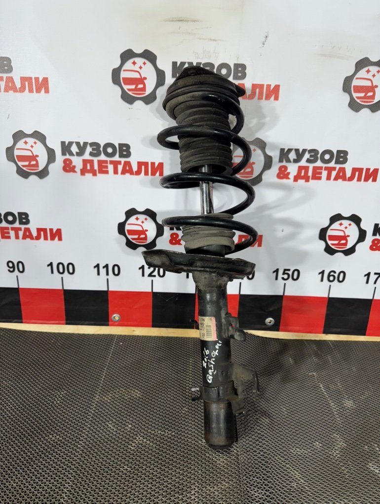 Стойка амортизатора Nissan Qashqai J11 2013 перед. прав. (б/у) Nissan Qashqai J11
