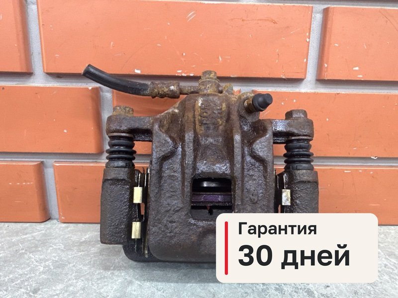 Суппорт Hyundai Santa Fe SM 2.7 G6BA 2004 задн. лев. (б/у)