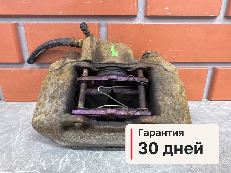 Суппорт Mitsubishi Pajero Sport 3 2.4 4N15 2018 задн. лев. (б/у)