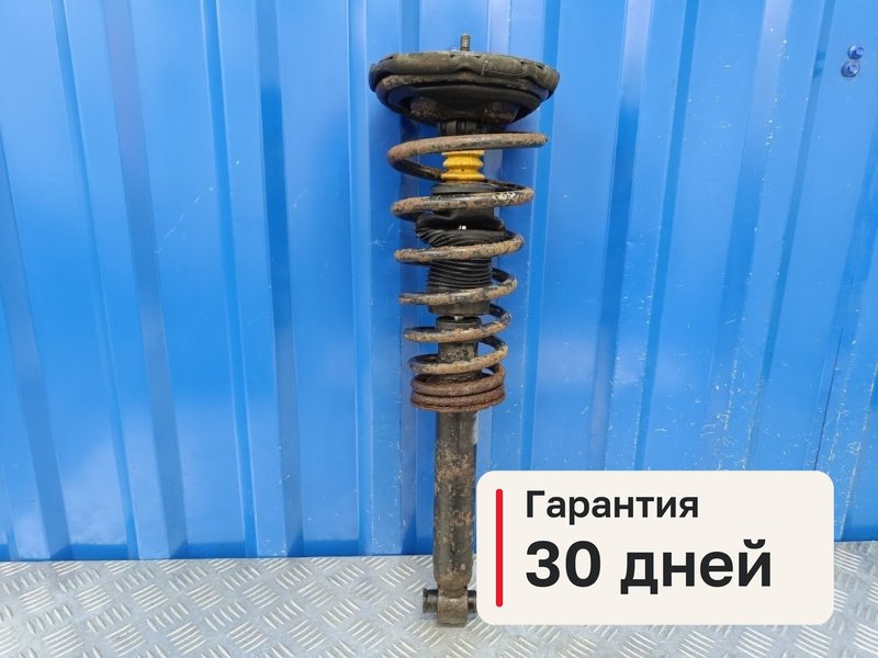 Амортизатор Nissan Primera P11 1.8 QG18DE 2000 перед. (б/у)