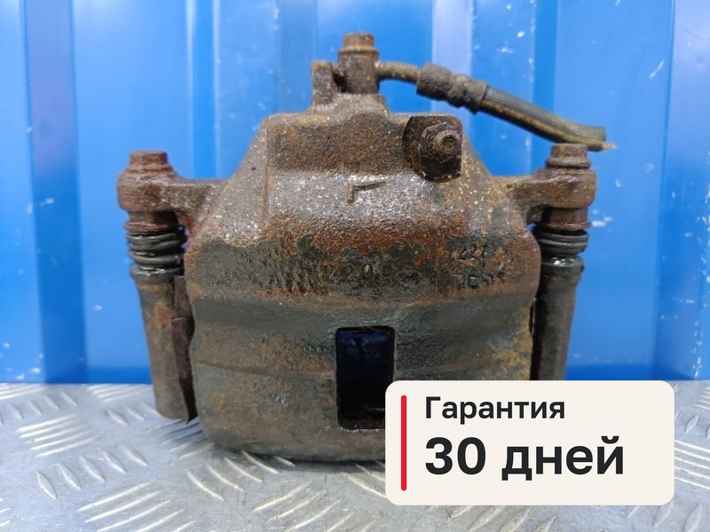 Суппорт Nissan Primera P11 1.8 QG18DE 2000 перед. лев. (б/у)