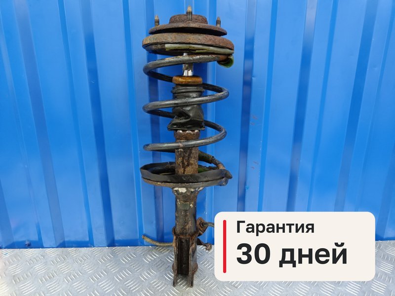 Амортизатор Mitsubishi Lancer 9 1.3 4G13 2004 перед. (б/у)