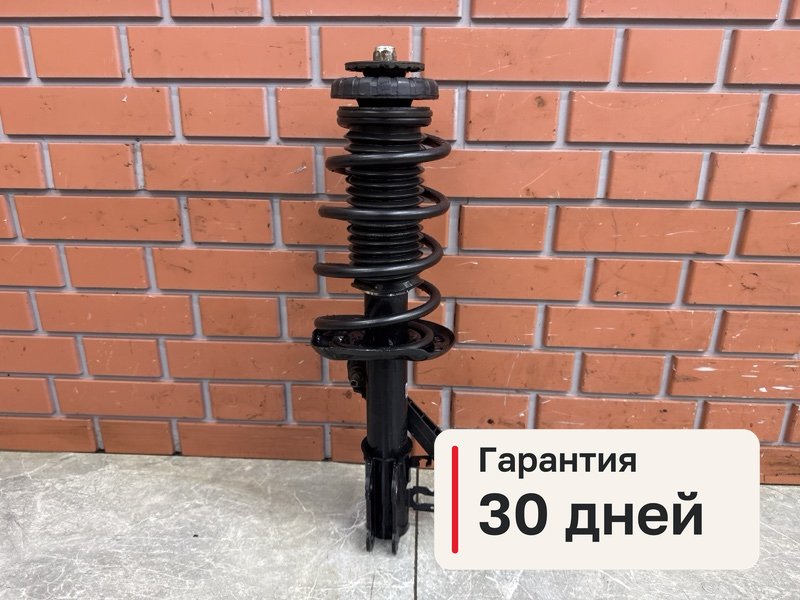 Амортизатор Chevrolet Aveo T300 1.6 F16D4 2013 перед. прав. (б/у)