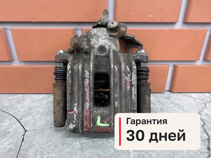 Суппорт Volkswagen Golf MK4 1.6 AZD 2000 задн. лев. (б/у)