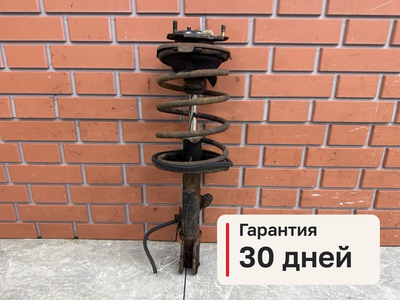 Амортизатор Chery Tiggo T11 2.4 4G64 2007 перед. лев. (б/у)