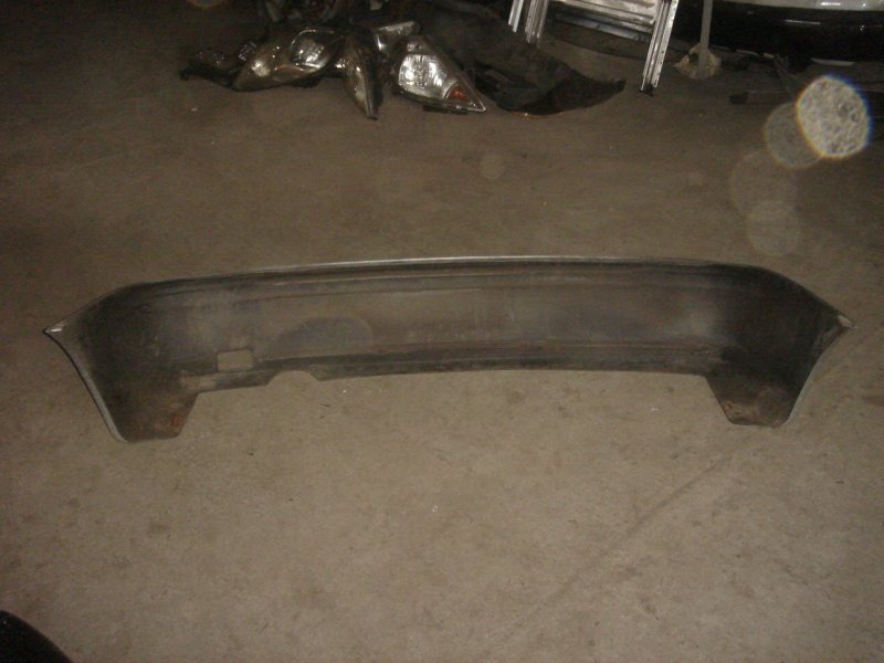 Бампер задний Nissan Almera N15
