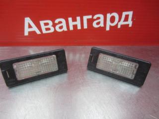Запчасть фонарь подсветки номера Skoda Rapid 2014