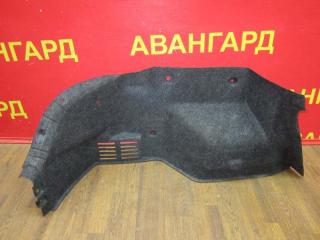 Обшивка багажника левая Kia Rio 2001