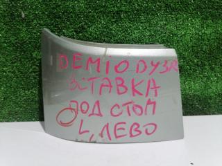 Запчасть накладка задняя левая MAZDA Demio
