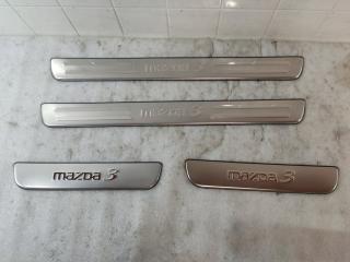 Запчасть накладка порога MAZDA 3 2006-2009