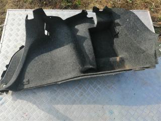 Запчасть обшивка багажника задняя левая Geely MK 2012
