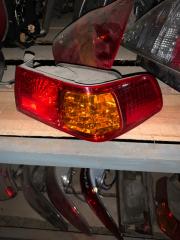 Фонарь заднего хода задний Toyota Camry 99-01